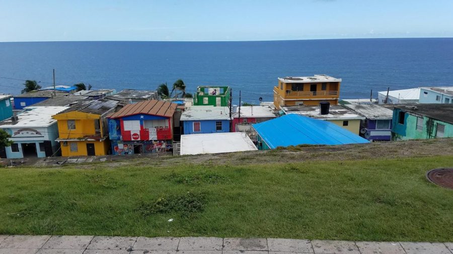 Some residents still  live in the ruins of their former homes , with nothing but a plastic blue tarp protecting them from the elements. Blue by Richard Maffei