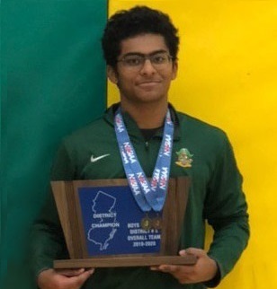 Decked out with awards, Vinayak Ganesan holds the District Varsity Boys Team Plaque wears the Squad Champion Gold Medal and the Épée District Varsity Third place medal for individuals. 