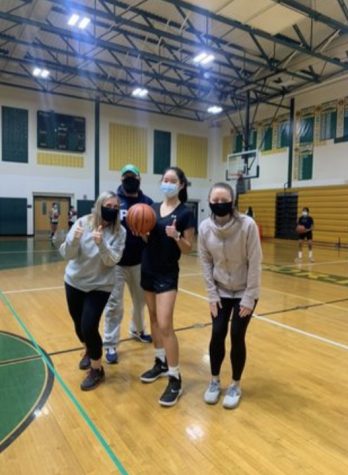 Katie Hsiao (‘23) at practice with her coaches.