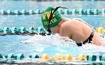 Sarah ('23) racing at a swim meet.