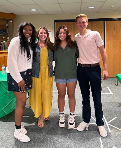 Members of the varsity track program at the track banquet.
From left to right: Ashley Emerah ('23), Coach Reilly, Solea Rubiano ('24), Logan Snyder ('23)