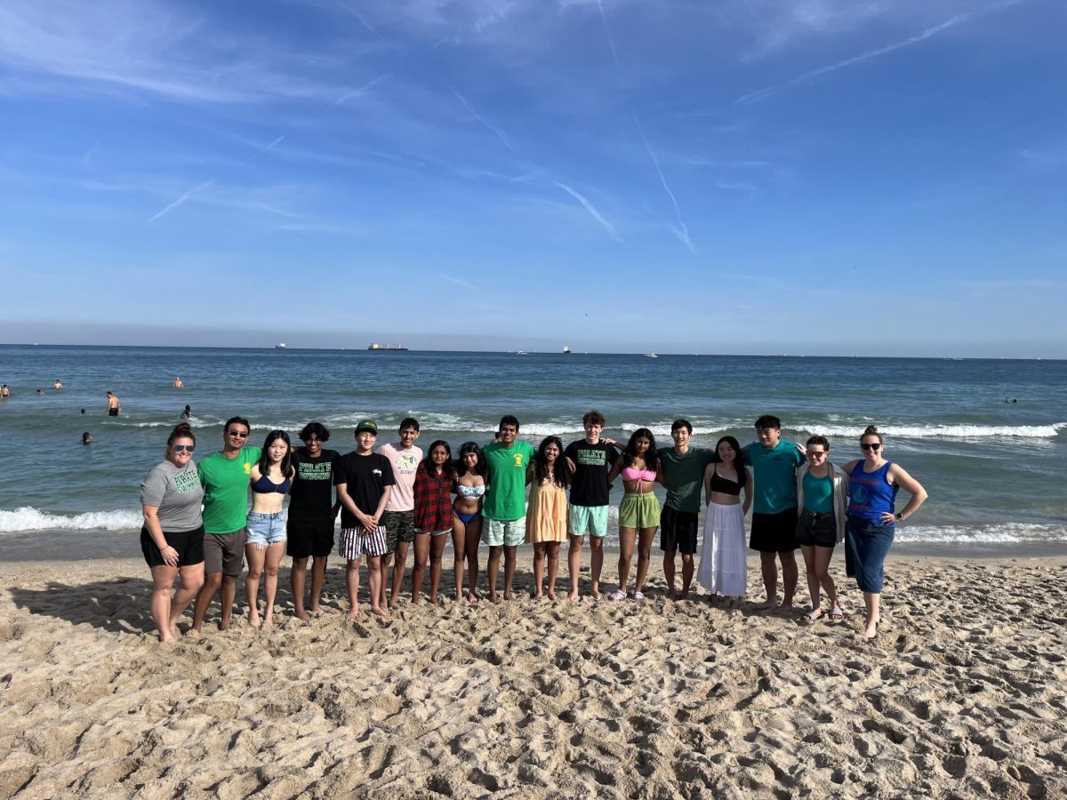 Swim team members at the beach in Florida.

From left to right: Coach Bidwell, Dylan Portelli (‘25), Helen Chen (‘26), Prabhav Vuttaluru (‘25), Erick Yan (‘26), Daksh
Yadav (‘26), Anushka Gaidhani (‘25), Anoushka Nataraj (‘25), Rohan Jois (‘24), Manika Niwas (‘25), Vini Stucker (‘24), Nidhi
Pramanik (‘26), Kevin Lang (‘25), Amanda Zou (‘24), Ethan Hung (‘25), Margaret Locket (‘25), Coach Reilly.