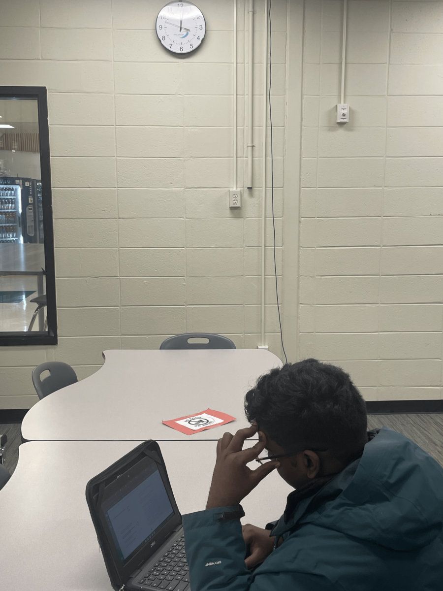 Keerthan Murali ('25) working in the library at 7:00 p.m.