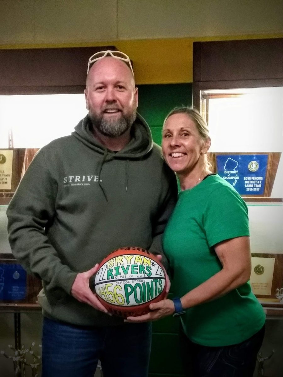 Mr.Fisher and Ms.Fitzpatrick celebrating South basketball