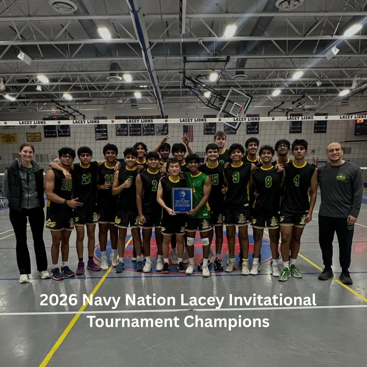 The varsity boys volleyball team holding the Lacey Tournament trophy.
